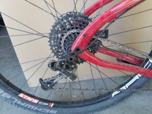 Rear derailleur of a wide range 2x11 speed drivetrain.